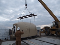 Monolithic Cabin Being moved